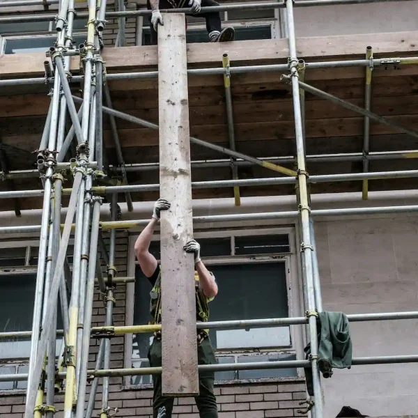 Las Vegas Scaffolding Rental workers installing scaffold boards on project site